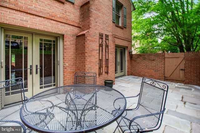 1802 24th St S, Arlington, VA 22202 - view of patio / terrace with french doors, outdoor dining space, and a gate