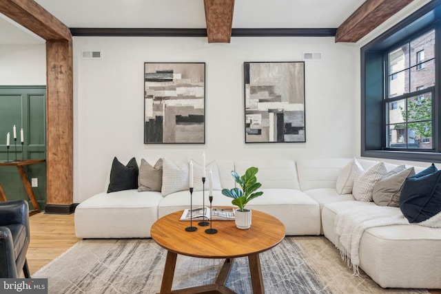 826 Tasker St, Philadelphia, PA 19148 - living area featuring wood finished floors and beamed ceiling