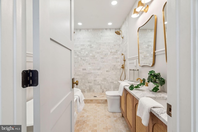 826 Tasker St, Philadelphia, PA 19148 - bathroom with tiled shower, toilet, vanity, and recessed lighting