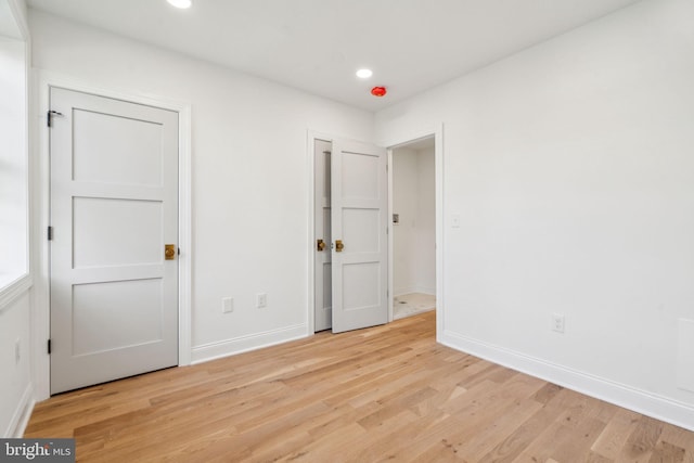 826 Tasker St, Philadelphia, PA 19148 - unfurnished bedroom with light wood-style flooring, baseboards, and recessed lighting