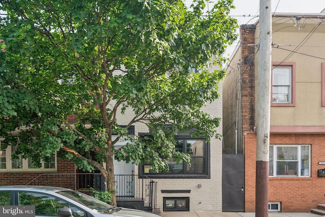 826 Tasker St, Philadelphia, PA 19148 - view of front facade with brick siding