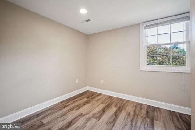 8818 Olympia Fields Ln, Vienna, VA 22182 - spare room featuring baseboards, wood finished floors, and recessed lighting