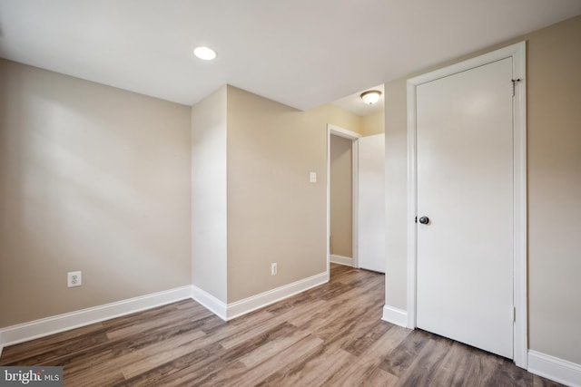 8818 Olympia Fields Ln, Vienna, VA 22182 - empty room featuring wood finished floors, baseboards, and recessed lighting