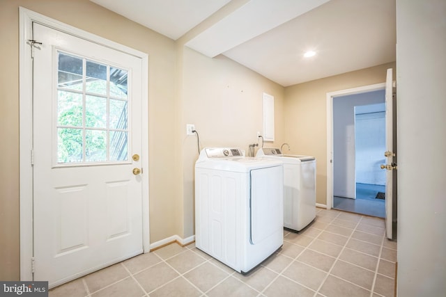 8818 Olympia Fields Ln, Vienna, VA 22182 - washroom featuring independent washer and dryer, light tile patterned flooring, and baseboards