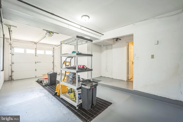 8818 Olympia Fields Ln, Vienna, VA 22182 - garage featuring a garage door opener