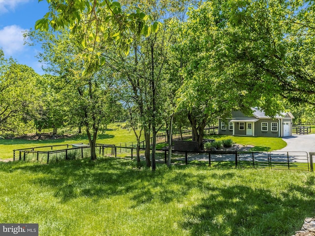 15953 River Bend Ct, Williamsport, MD 21795 - fenced yard featuring a garage and driveway