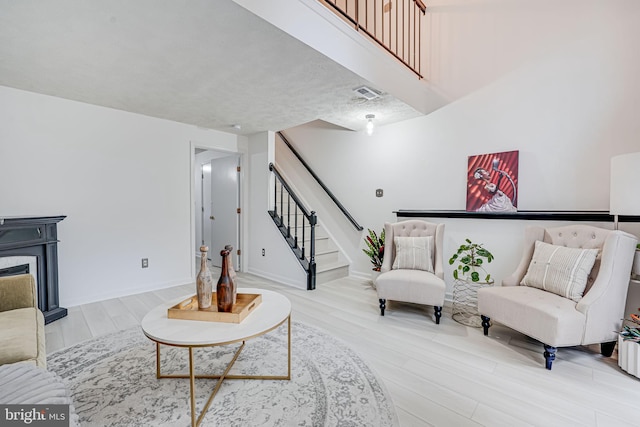 13916 Preacher Chapman Pl, Centreville, VA 20121 - living room featuring wood finished floors and stairway