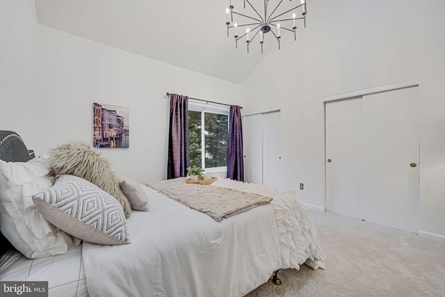 13916 Preacher Chapman Pl, Centreville, VA 20121 - bedroom with multiple closets, high vaulted ceiling, carpet, a chandelier, and baseboards