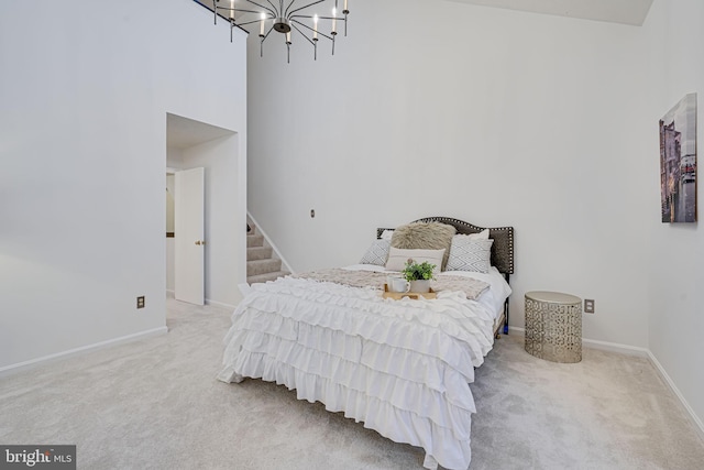 13916 Preacher Chapman Pl, Centreville, VA 20121 - carpeted bedroom with a chandelier, baseboards, and a high ceiling