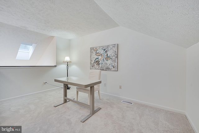 13916 Preacher Chapman Pl, Centreville, VA 20121 - home office with a skylight, a textured ceiling, lofted ceiling, carpet, and baseboards