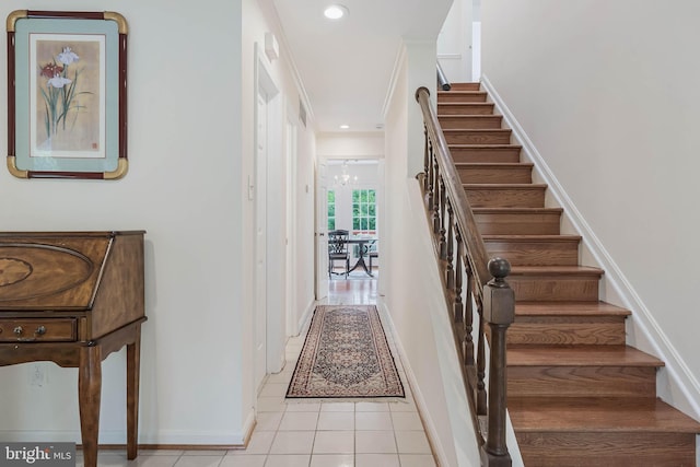6808 Canal Bridge Ct, Potomac, MD 20854 - stairway with tile patterned flooring, baseboards, crown molding, a chandelier, and recessed lighting
