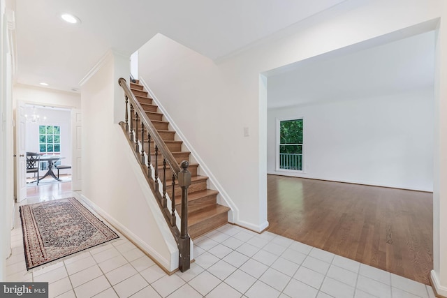 6808 Canal Bridge Ct, Potomac, MD 20854 - stairway with tile patterned floors, crown molding, a chandelier, baseboards, and recessed lighting