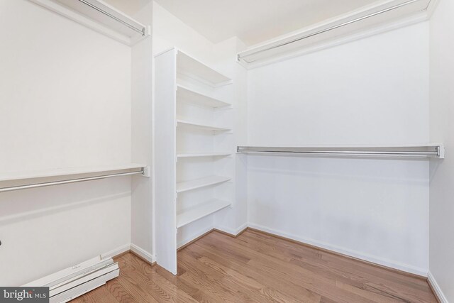 6808 Canal Bridge Ct, Potomac, MD 20854 - walk in closet featuring wood finished floors