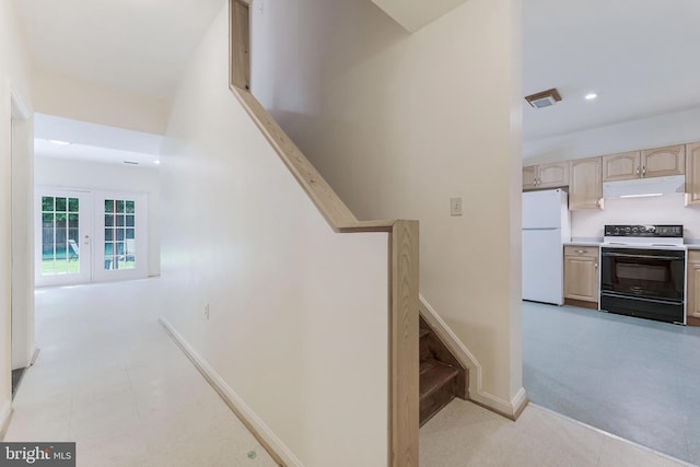 6808 Canal Bridge Ct, Potomac, MD 20854 - stairway featuring baseboards, recessed lighting, and french doors