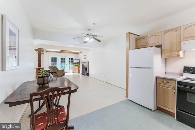 6808 Canal Bridge Ct, Potomac, MD 20854 - kitchen featuring freestanding refrigerator, range with electric cooktop, light brown cabinetry, ceiling fan, and light countertops