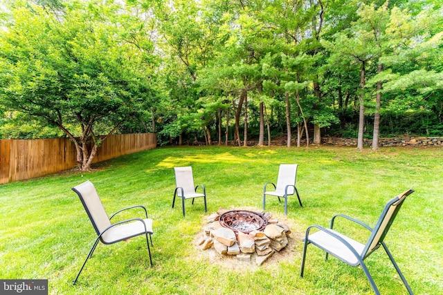 6808 Canal Bridge Ct, Potomac, MD 20854 - view of yard with a fire pit