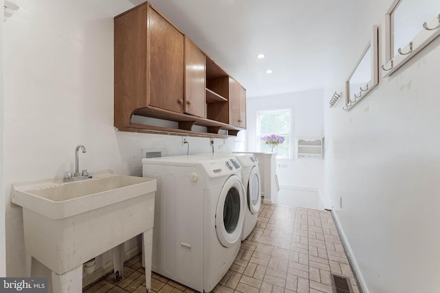 6808 Canal Bridge Ct, Potomac, MD 20854 - laundry room featuring cabinet space, washer and dryer, brick patterned floors, baseboards, and recessed lighting