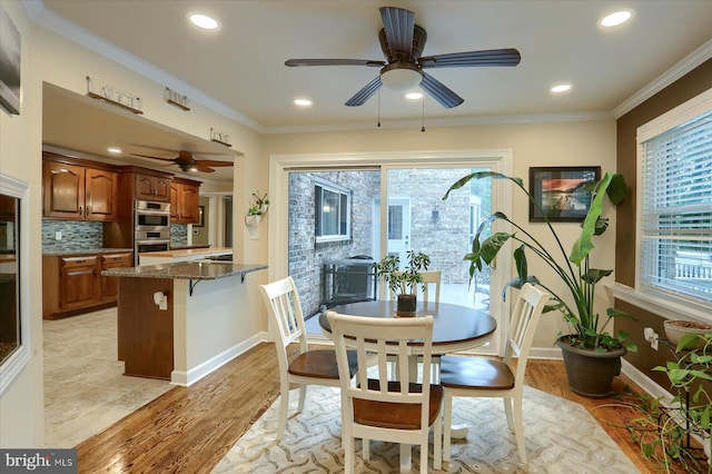 1715 Mountain View Rd, Harrisburg, PA 17110 - dining space with a ceiling fan, light wood-style flooring, baseboards, recessed lighting, and crown molding