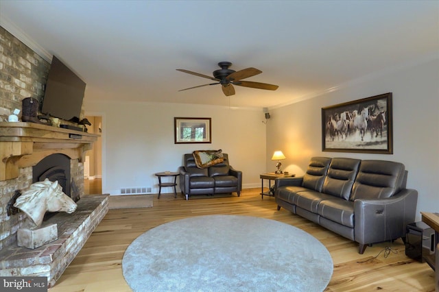 1715 Mountain View Rd, Harrisburg, PA 17110 - living area with ceiling fan, wood finished floors, crown molding, a fireplace, and baseboards