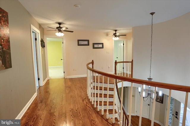 1715 Mountain View Rd, Harrisburg, PA 17110 - hall featuring wood finished floors, an upstairs landing, and baseboards