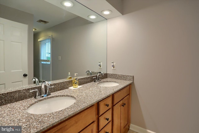 1715 Mountain View Rd, Harrisburg, PA 17110 - bathroom featuring double vanity, recessed lighting, and baseboards