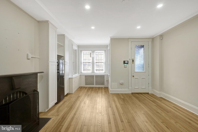 812 E St SE, Washington, DC 20003 - foyer featuring light wood-style floors, baseboards, recessed lighting, and crown molding