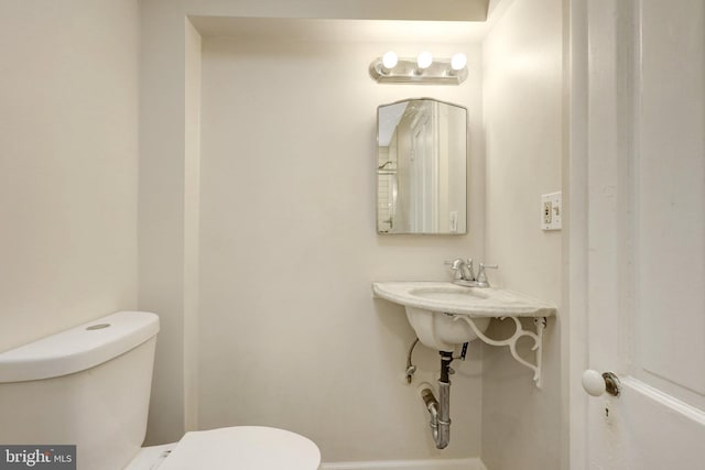 812 E St SE, Washington, DC 20003 - half bath featuring toilet and baseboards