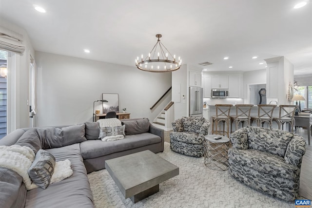 23 Trillium Close, Wintergreen Resort, VA 22967 - living area featuring recessed lighting, stairs, a chandelier, and wood finished floors