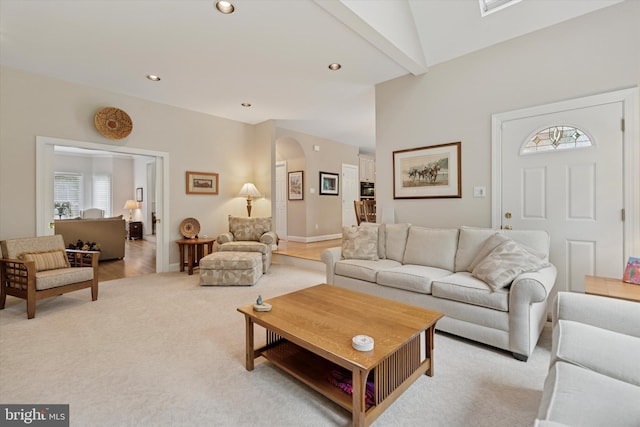 20 Dorchester Way, Phoenixville, PA 19460 - living area with arched walkways, recessed lighting, lofted ceiling, light carpet, and baseboards