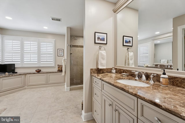 20 Dorchester Way, Phoenixville, PA 19460 - bathroom featuring a stall shower, vanity, plenty of natural light, tile patterned flooring, and recessed lighting