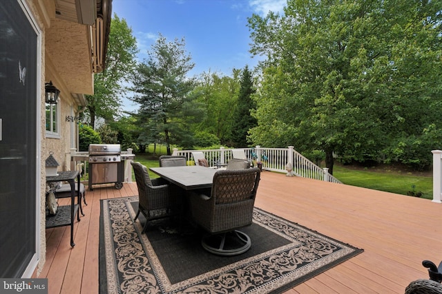 20 Dorchester Way, Phoenixville, PA 19460 - deck featuring grilling area, outdoor dining space, and view of scattered trees