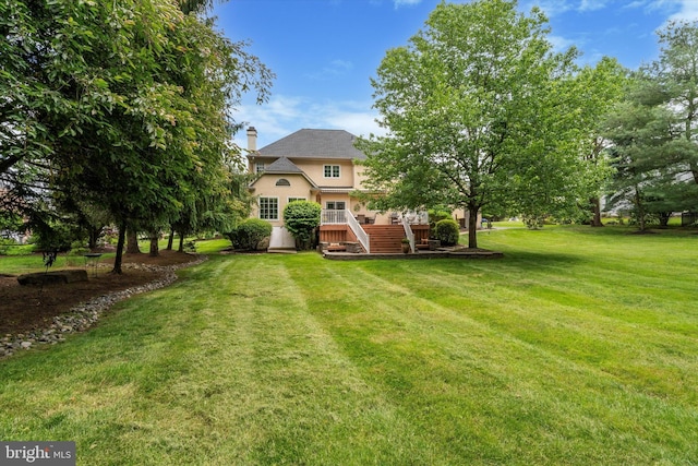 20 Dorchester Way, Phoenixville, PA 19460 - view of grassy yard featuring a deck