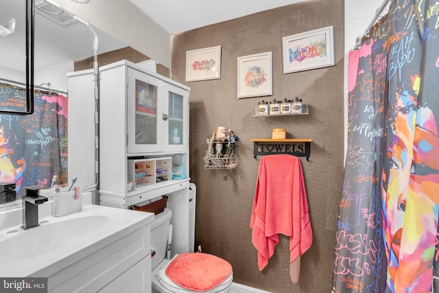 463 Bronco Trl, Lusby, MD 20657 - bathroom with toilet, vanity, and curtained shower