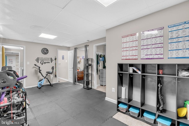 463 Bronco Trl, Lusby, MD 20657 - workout room featuring a drop ceiling and baseboards