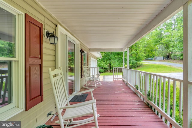 463 Bronco Trl, Lusby, MD 20657 - wooden terrace featuring a porch