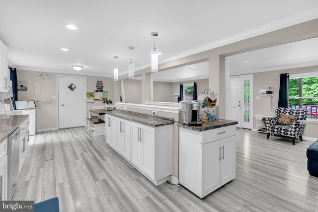 463 Bronco Trl, Lusby, MD 20657 - kitchen with ornamental molding, light wood finished floors, recessed lighting, and white cabinets