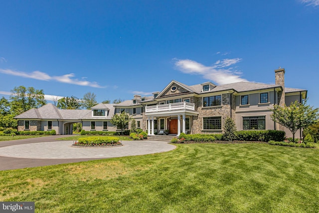 280 Carter Rd, Princeton, NJ 08540 - shingle-style home featuring a balcony, a chimney, a front lawn, and curved driveway