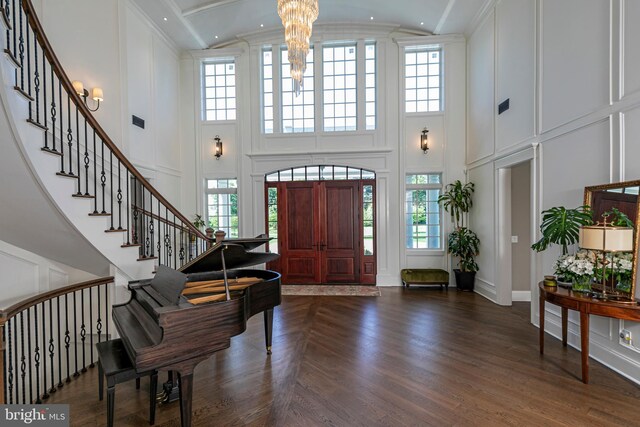 280 Carter Rd, Princeton, NJ 08540 - foyer featuring a towering ceiling, a decorative wall, healthy amount of natural light, stairway, and a chandelier