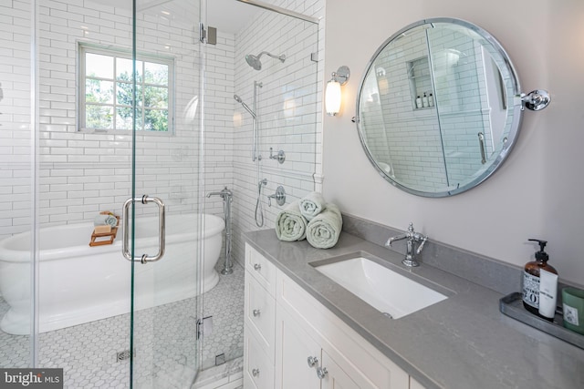 280 Carter Rd, Princeton, NJ 08540 - bathroom featuring vanity, a soaking tub, a stall shower, and tile patterned flooring