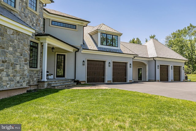280 Carter Rd, Princeton, NJ 08540 - view of front of property featuring stucco siding, stone siding, a front lawn, driveway, and a high end roof