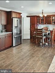 60 Windsor Ln, Willingboro, NJ 08046 - kitchen featuring stainless steel fridge, backsplash, light countertops, glass insert cabinets, and recessed lighting