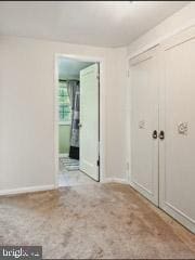 60 Windsor Ln, Willingboro, NJ 08046 - unfurnished bedroom featuring a closet, baseboards, and carpet flooring