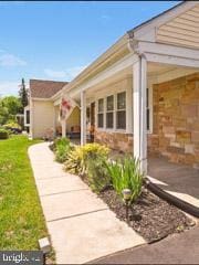 60 Windsor Ln, Willingboro, NJ 08046 - view of home's exterior featuring a lawn