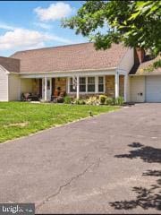 60 Windsor Ln, Willingboro, NJ 08046 - ranch-style house with driveway, a front lawn, and a garage