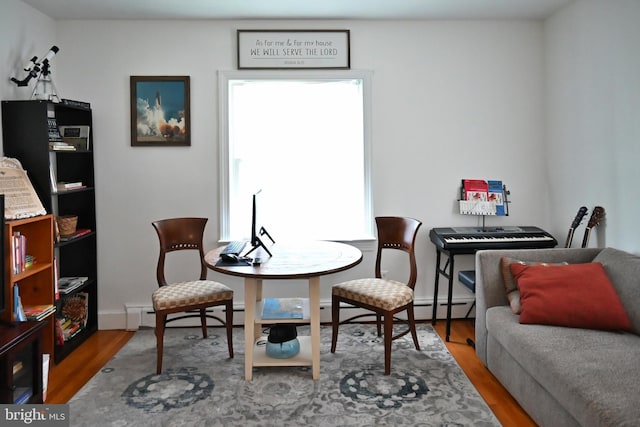 9706 Fairway Dr, New Market, VA 22844 - dining room with plenty of natural light, wood finished floors, and a baseboard radiator