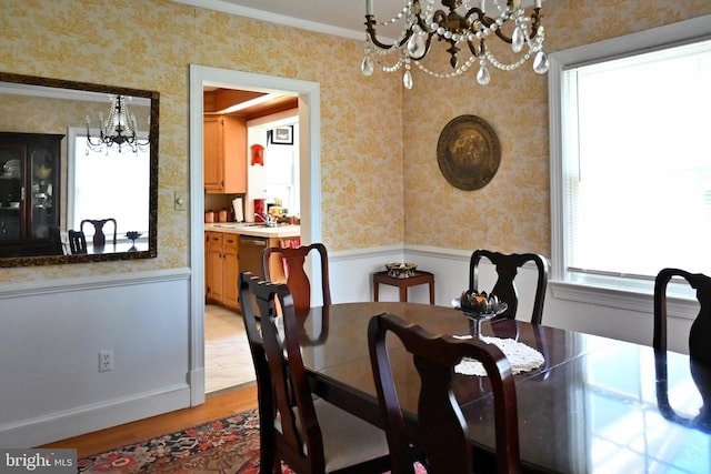 9706 Fairway Dr, New Market, VA 22844 - dining area with a chandelier, wallpapered walls, and light wood-style flooring