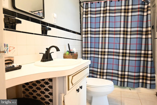9706 Fairway Dr, New Market, VA 22844 - full bathroom featuring vanity, curtained shower, toilet, tile patterned floors, and tile walls