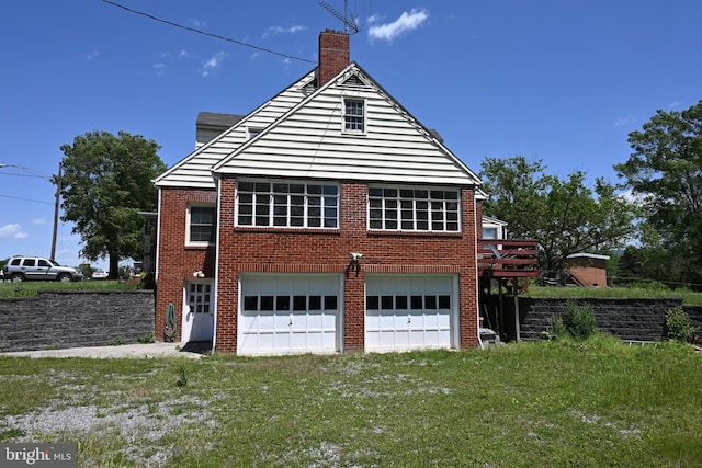 9706 Fairway Dr, New Market, VA 22844 - view of side of property featuring brick siding, a chimney, a garage, a yard, and a wooden deck