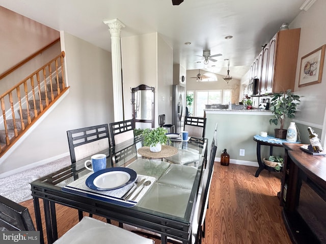 7226 Waldman Ave, Sparrows Point, MD 21219 - dining room featuring a ceiling fan, stairway, wood finished floors, and baseboards