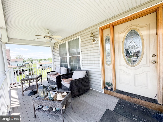 7226 Waldman Ave, Sparrows Point, MD 21219 - view of exterior entry with a ceiling fan and covered porch